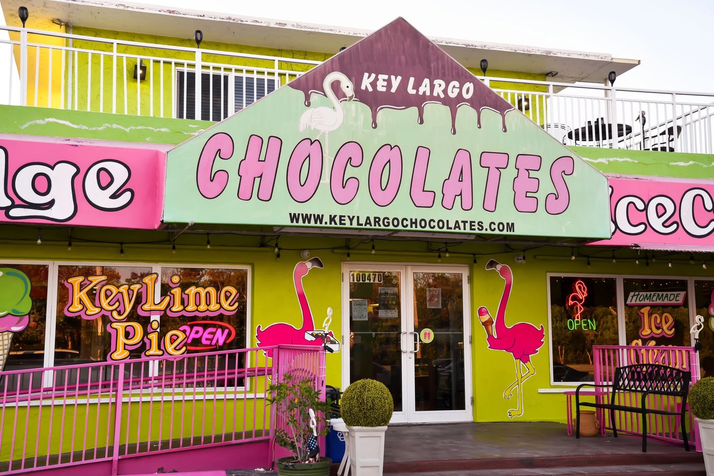 The Keys Chocolates pink-and-green storefront at Mile Marker 100 in Key Largo, FL