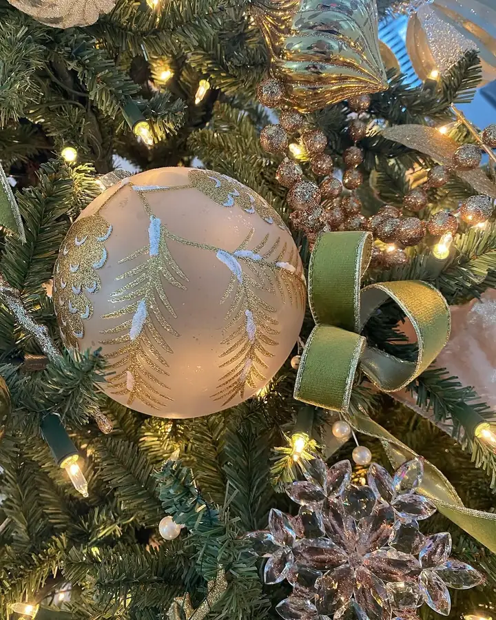 An oversized blush ornament, the kind of piece that anchors a section
