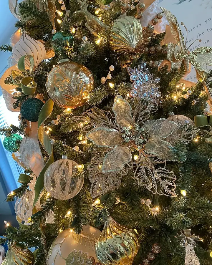 Gold and green ornaments clustered with sheer ribbon