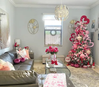 Pink Valentine's Day tree with hearts in a styled Miami living room